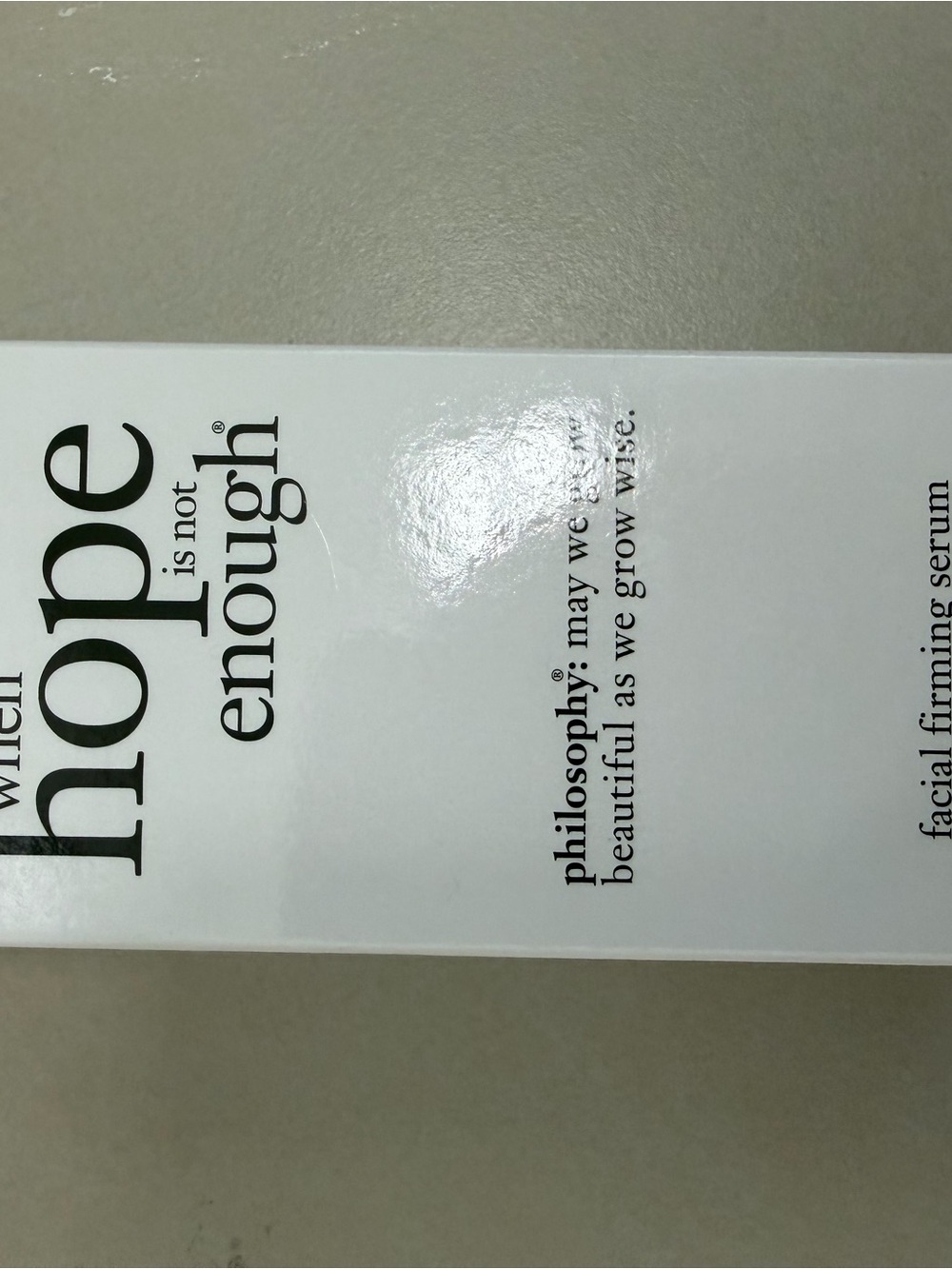 Philosophy facial firming serum in white packaging